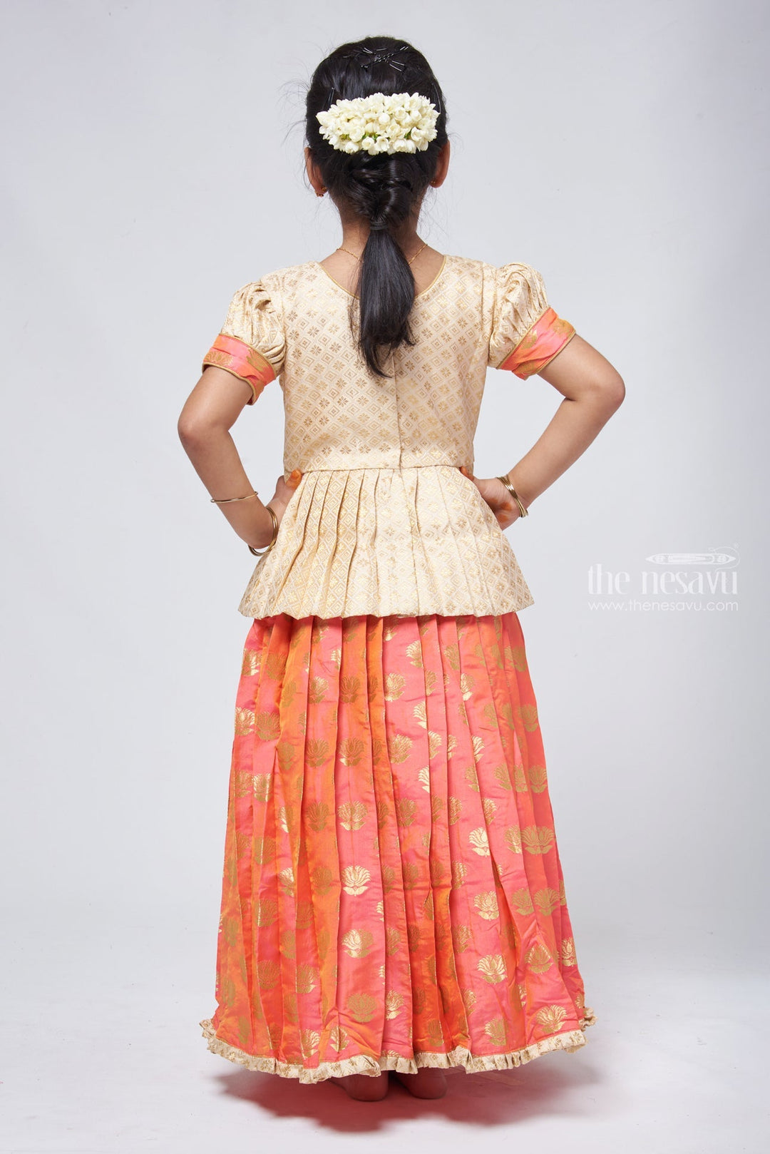 The Nesavu Pattu Pavadai Butta Pleated Pink Skirt with Brocade Beige Silk Peplum Blouse: Festive Delight for Celebrations Nesavu Designer Pattu Pavadai | Pattu Pavadai Neck Designs | The Nesavu