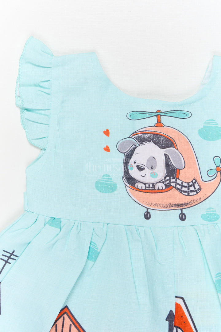 The Nesavu Baby Cotton Frocks Cartoon Town Cotton Frock for Baby Girls with Soft Frill Sleeve Finish Nesavu Nesavu baby girl cartoon digital print cotton frock with town and helicopter design