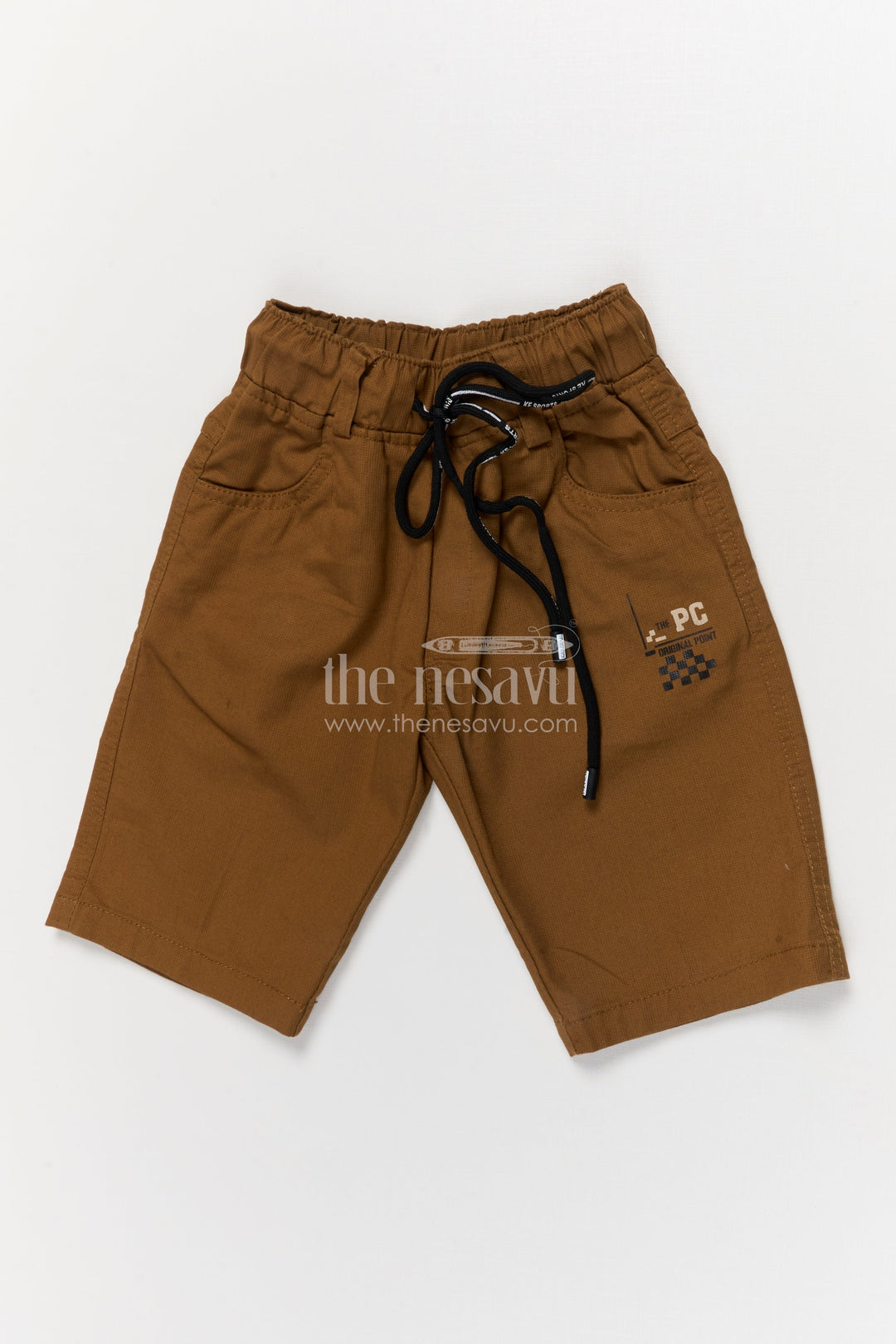 The Nesavu Boys Shorts Casual Boys Cotton Shorts with Sporty Badge and Drawstring Waist Nesavu Boys cotton shorts with checkered flag graphic and sporty print