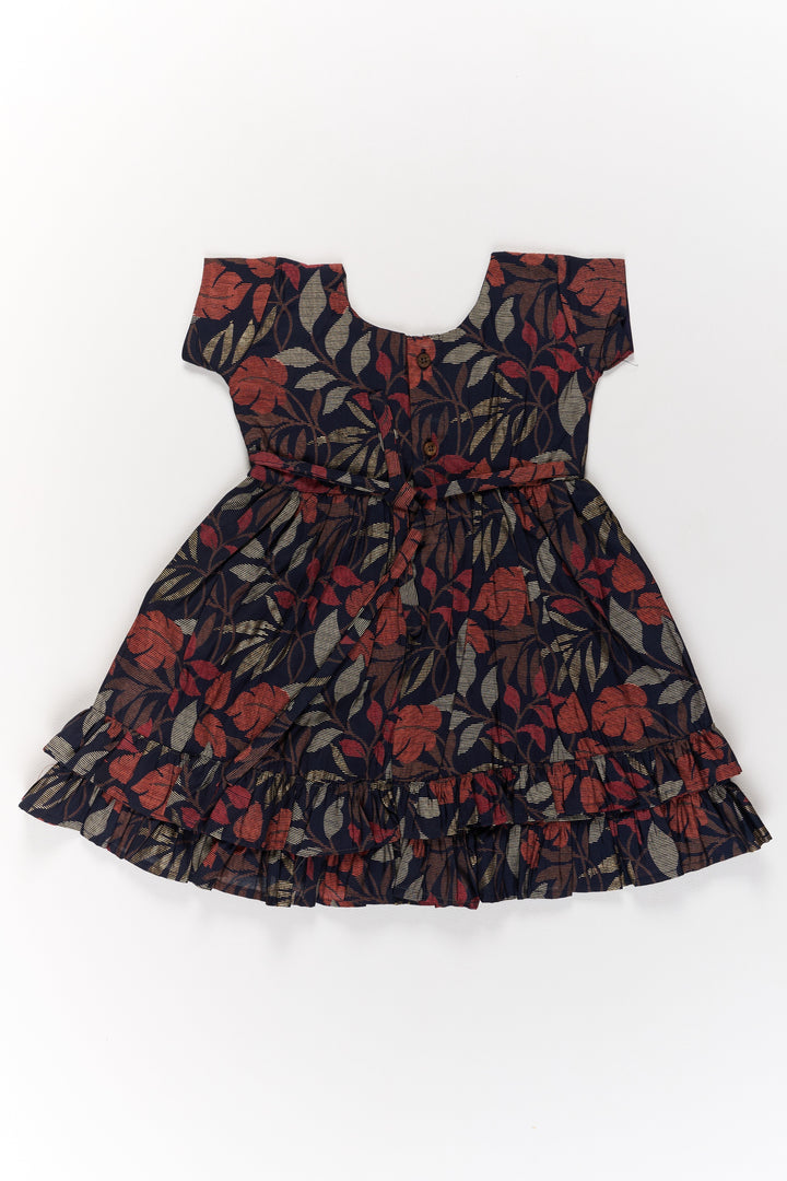 The Nesavu Girls Cotton Frock Charming Black Cotton Party Frock for Girls with Elegant Leaf Print and Frill Hem Nesavu Charming Black Cotton Party Frock Girls Elegant Leaf Print Frill Hem | The Nesavu
