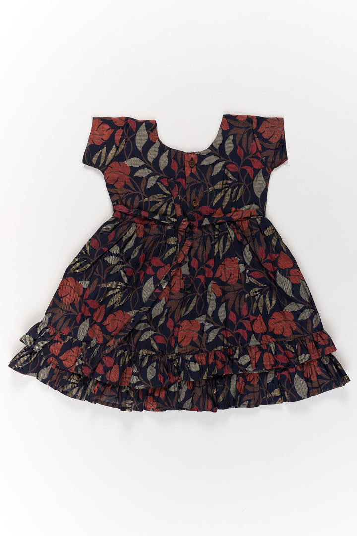 The Nesavu Girls Cotton Frock Charming Black Cotton Party Frock for Girls with Elegant Leaf Print and Frill Hem Nesavu Nesavu Charming Black Cotton Party Frock Girls Elegant Leaf Print Frill Hem
