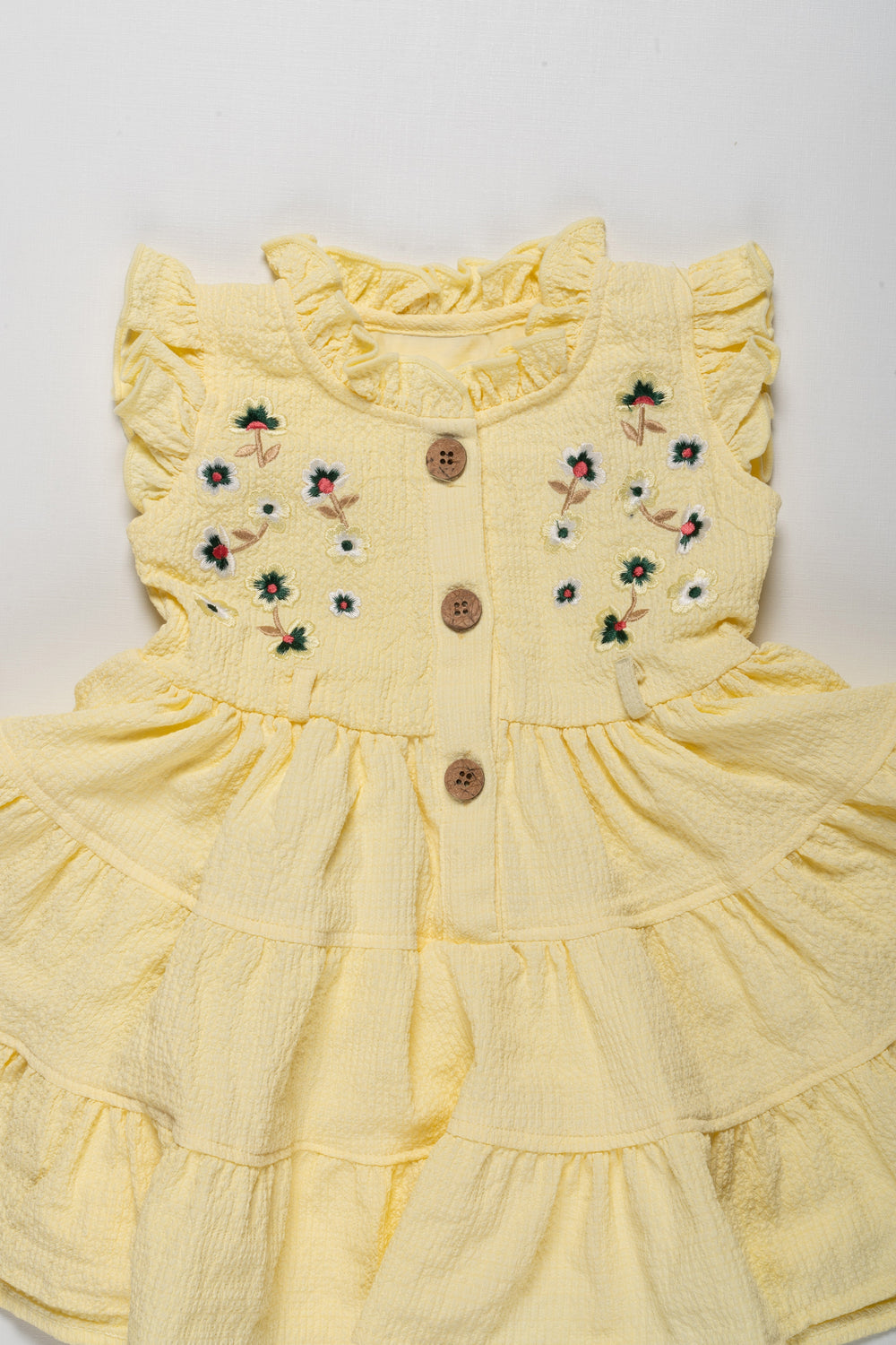 The Nesavu Girls Cotton Frock Charming Girls Yellow Ruffle Cotton Frock with Floral Embroidery Nesavu Charming Girls Yellow Ruffle Cotton Frock with Floral Embroidery | The Nesavu