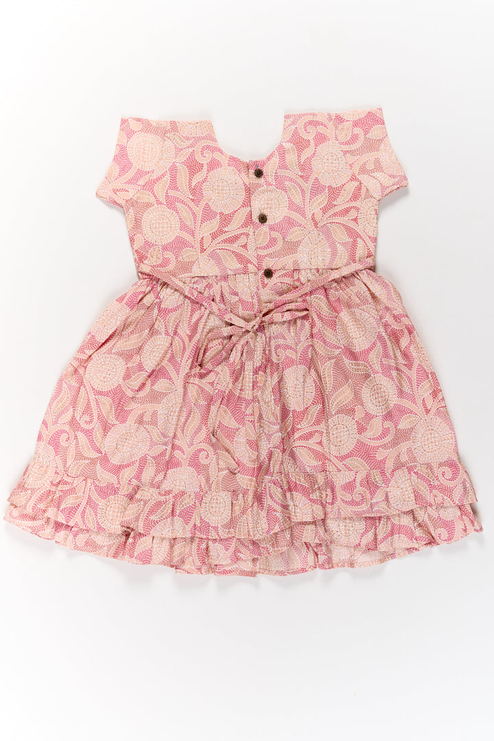 The Nesavu Girls Cotton Frock Charming Pink Cotton Girls Frock with Floral Patterns and Ruffled Sleeves for Everyday Wear Nesavu Nesavu Charming Pink Cotton Girls Frock Floral Patterns Ruffled Sleeves Everyday Wear
