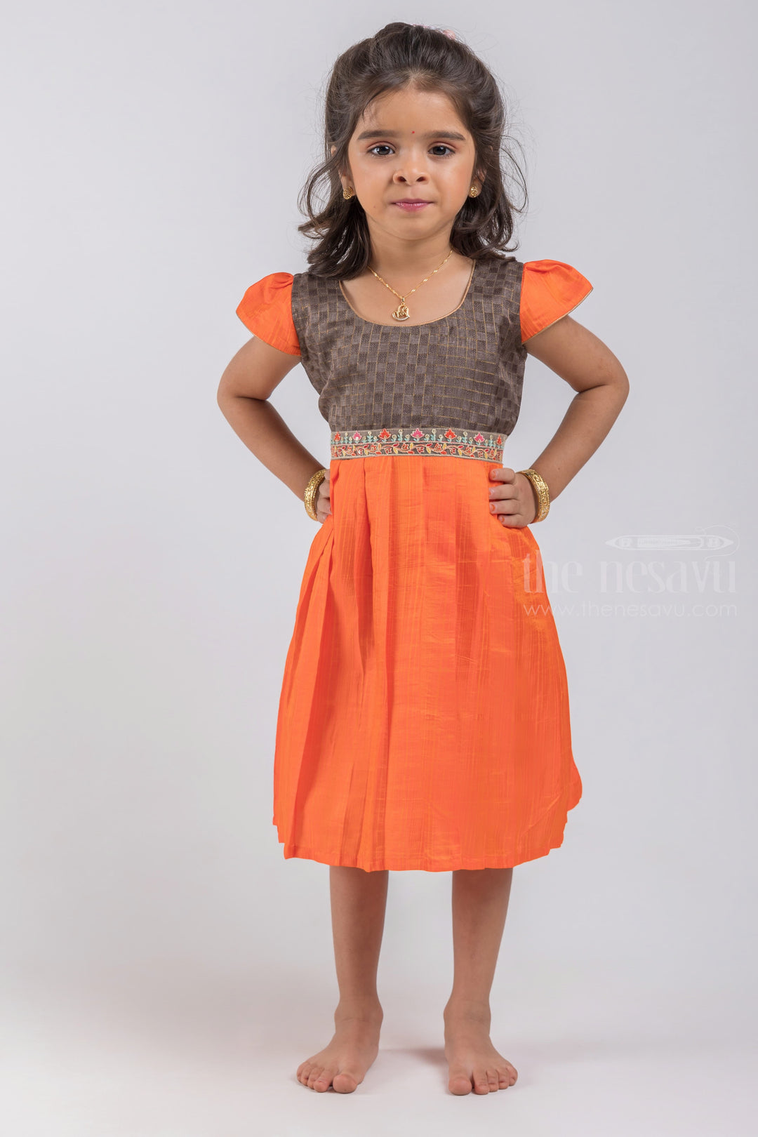 The Nesavu Silk Embroidered Frock Checked Pattern Black Yoke and Knife Pleated Orange Silk Frock for Girls psr silks Nesavu 16 (1Y) / Orange / Semi Silk SF633