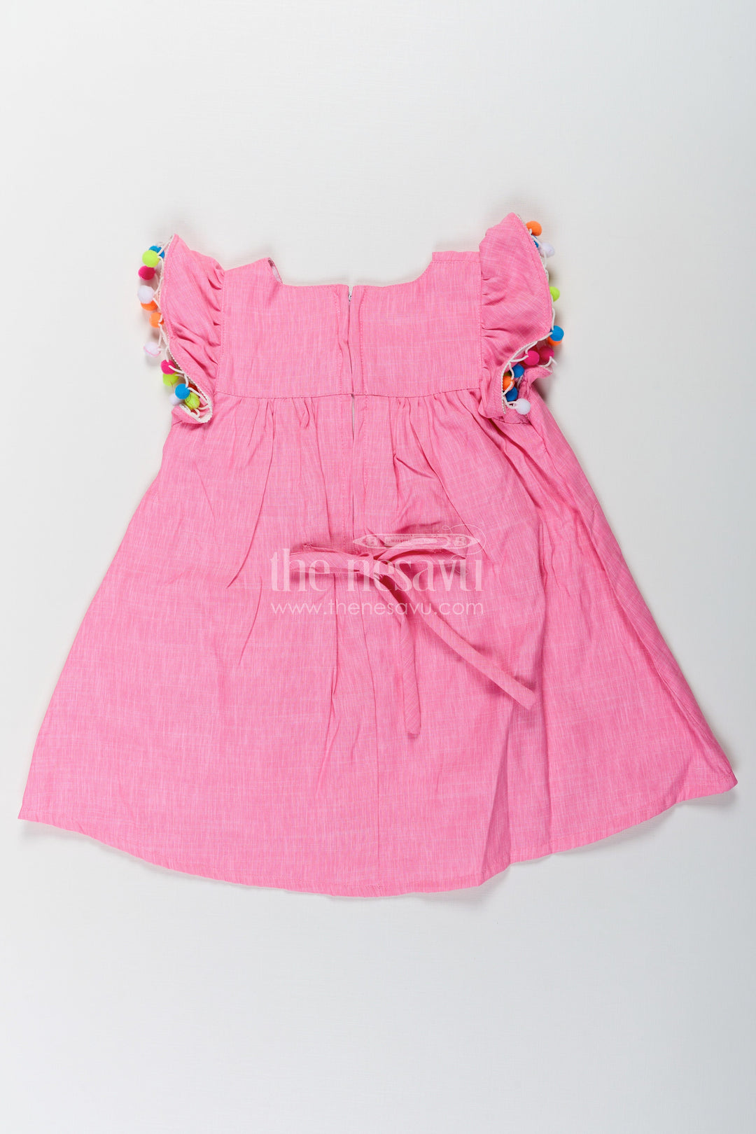 The Nesavu Baby Cotton Frocks Chhote Bacchon Ke Liye Frock in Pink Cotton Blend with Pom Poms and Butterfly Patch Embroidery Nesavu Nesavu Pink Frock Chhote Bacchon Pom Pom Sleeves Sequin Butterfly Patch