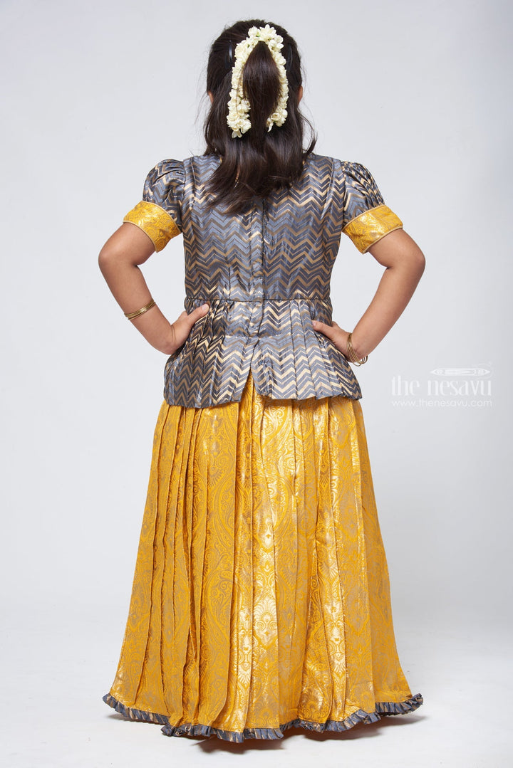 The Nesavu Pattu Pavadai Chic Zig Zag Gray Peplum Top with Banarasi Designer Pattu Pavadai: Festive Delight for Girls Nesavu Banarasi Designer Yellow Pattu Pavadai | Pattu Pavadai New Model | The Nesavu