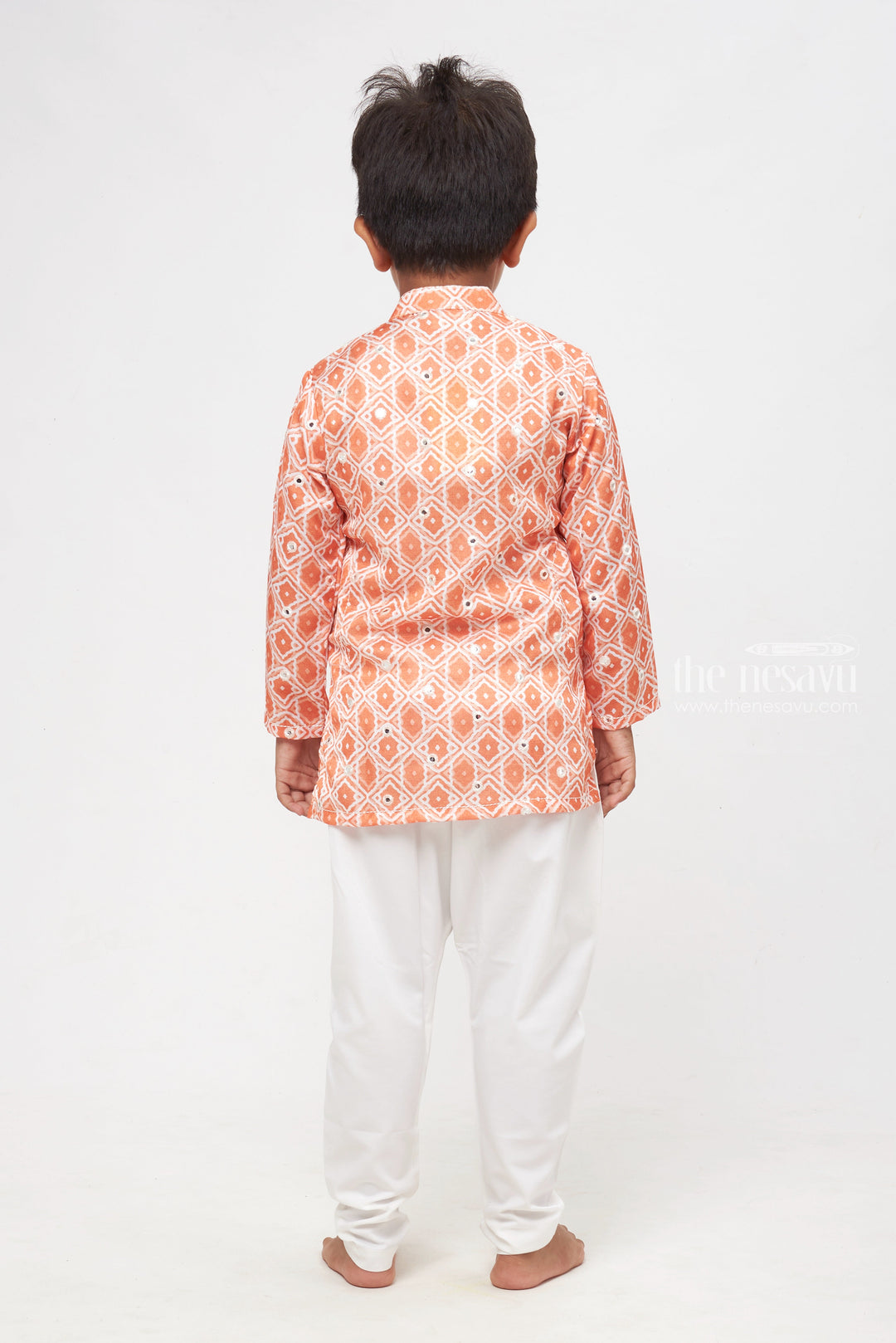 The Nesavu Boys Kurtha Set Citrus Charm: Mirror-Embroidered Geometric Printed Orange Kurta Shirt & Pant Set for Boys Nesavu Premium Boys Kurta with Pant Collections | Traditional Elegance Redefined | The Nesavu