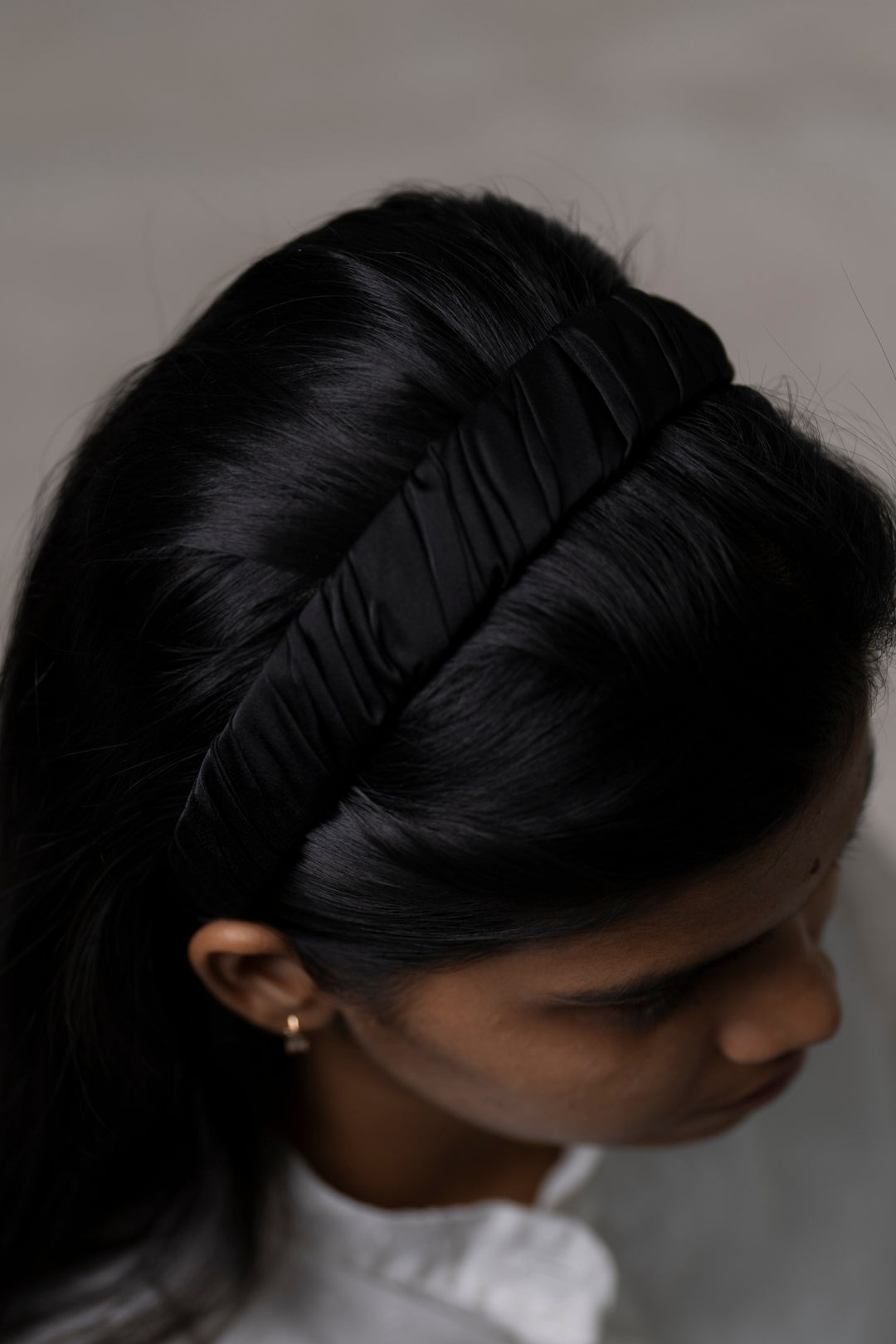 The Nesavu Hair Band Classic Black Ruched Satin Hairband for Everyday Elegance Nesavu Black JHB85E Ruched Satin Hairband in Black | Chic Hair Accessory for Stylish Looks | The Nesavu