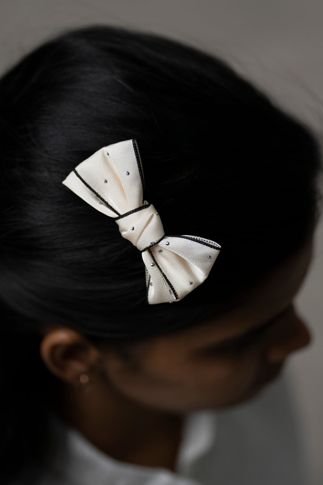 The Nesavu Hair Clip Classic Elegance White Bow Hair Clip with Crystal Accents Nesavu Half white JHCL72A White Bow Hair Clip for Girls | Timeless Hair Accessory with Sparkle | The Nesavu