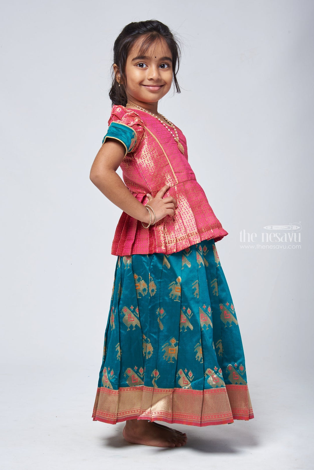 The Nesavu Pattu Pavadai Classic Pattu Langa Silk Peplum Green Blouse with Traditional Pavadai Sattai - Festive Delight Nesavu Girls Pattu Skirt And Blouse Set | Indian Ethnic Dress For Kids | The Nesavu