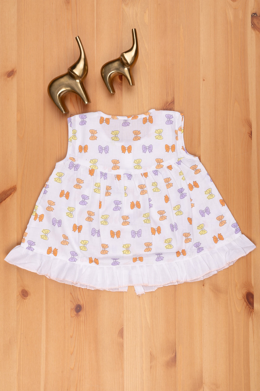 The Nesavu Baby Frock / Jhabla Colorful Bow Print White Dress: Perfect Little Girls Choice Nesavu 12 (3M) / Peach BFJ445B-12 Fancy Baby Dress Online | Printed Fancy Frock For Girls | The Nesavu