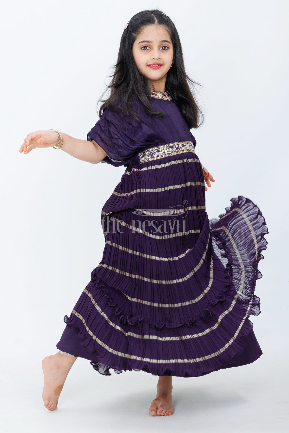 The Nesavu Girls Silk Gown Copper Shimmer Tissue Girls Silk Gown with Multicolored Border and Floral Waist Embroidery Nesavu Nesavu Copper Shimmer Girls Silk Gown Multicolored Border Embroidered Floral Waist