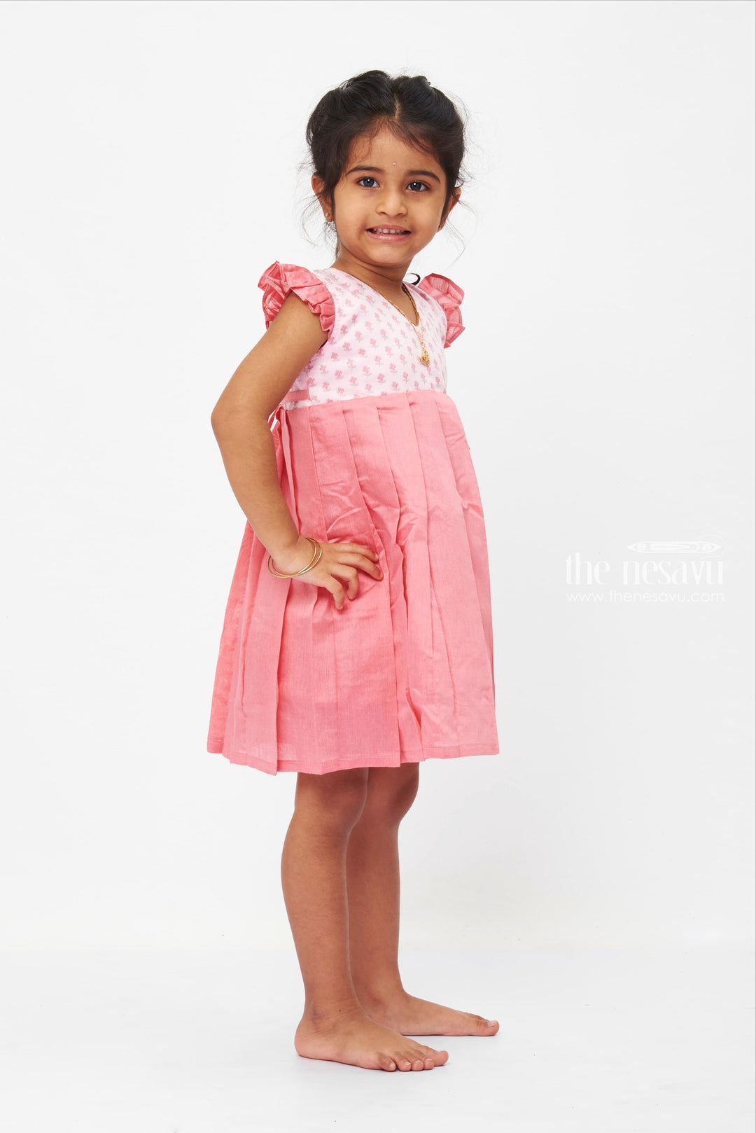 The Nesavu Girls Cotton Frock Coral Pleated Cotton Dress with Floral Printed Yoke for Girls Nesavu Girls Floral Yoke Pleated Dress | Coral Cotton Frock for Casual Wear | The Nesavu