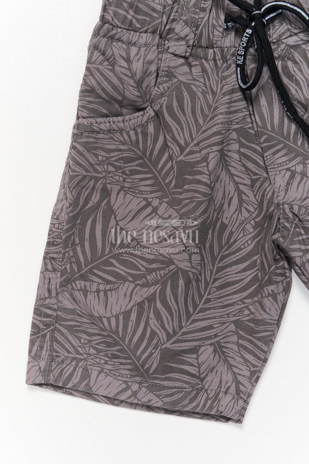 The Nesavu Boys Shorts Cotton Boys Shorts with All-over Tropical Leaf Print and Relaxed Fit Nesavu Boys casual printed shorts with leaf design and drawstring waist
