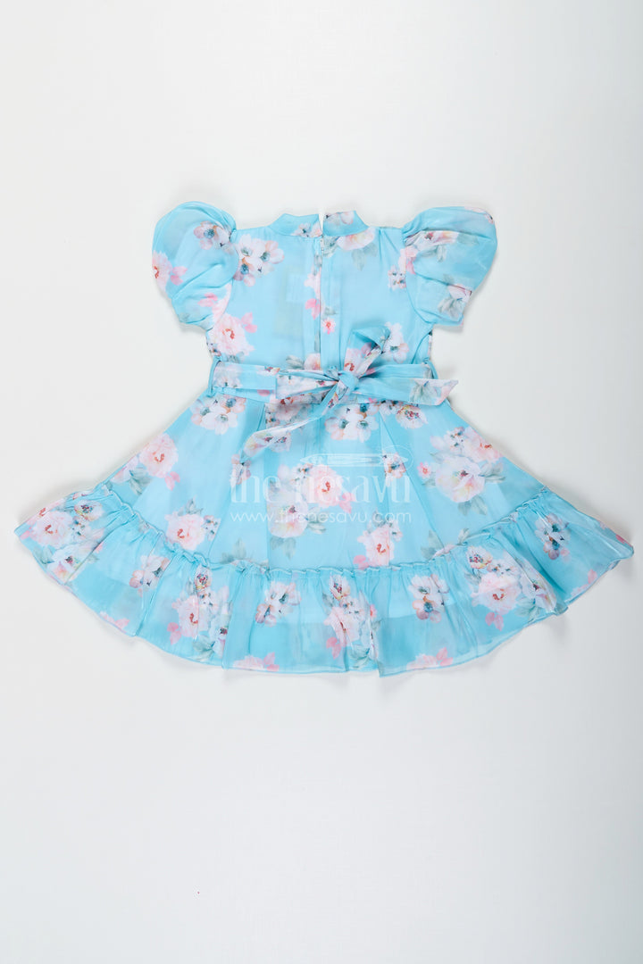 The Nesavu Girls Fancy Frock Cotton Ethnic Frock for Girls in Aqua Blue Chiffon with Digital Floral Print and Ruffle Details Nesavu Nesavu Cotton Ethnic Frock for Girls in Aqua Chiffon with Digital Floral Print and Ruffle Details