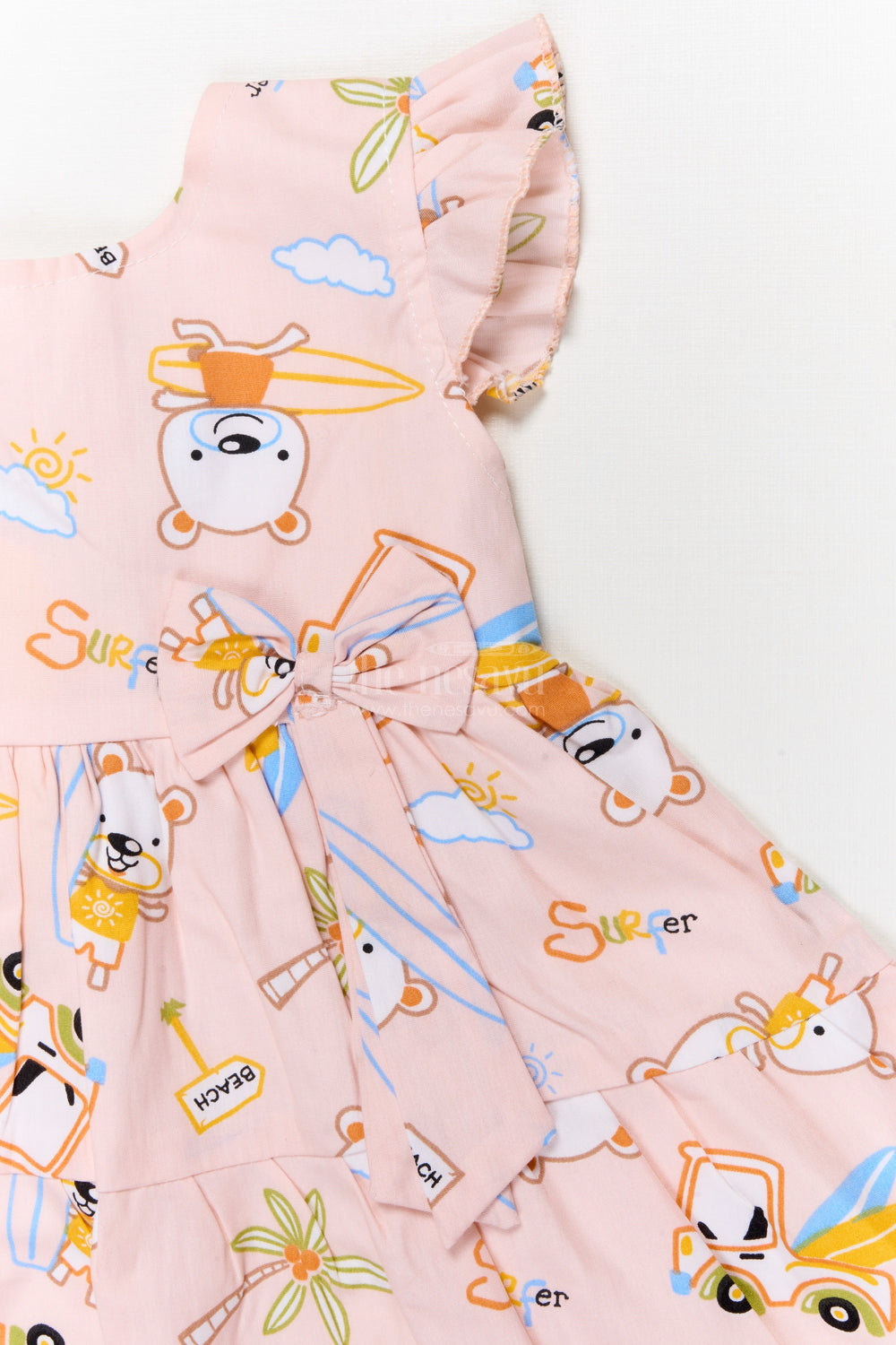 The Nesavu Baby Cotton Frocks Cotton Frock for Baby Girls with Surfer Bear Print and Bow for Summer Playdates Nesavu Nesavu cotton frock for baby girls with surfer bear digital print and frill sleeves for summer play