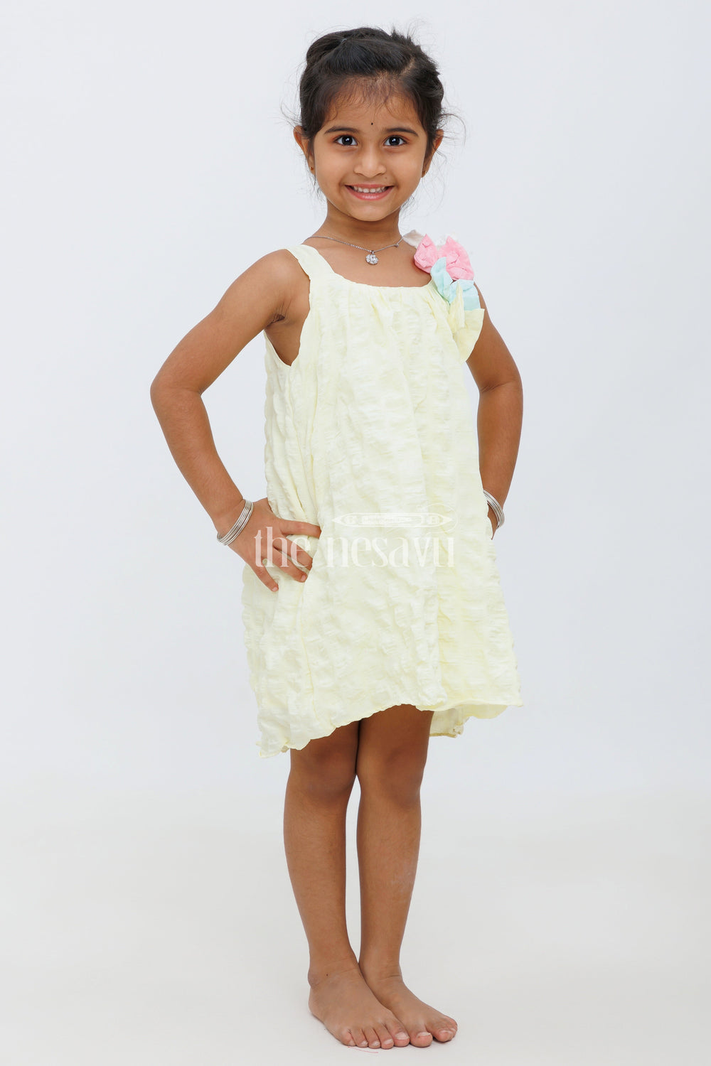 The Nesavu Baby Fancy Frock Cream Blended Popcorn Fabric Strapped Baby Fancy Frock with Colorful Bow for Girls Nesavu Cream Blended Popcorn Fabric Baby Fancy Frock with Colorful Bow for Girls Nesavu