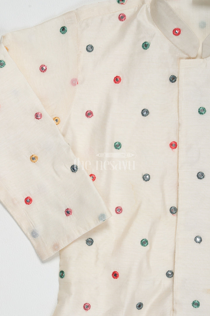 The Nesavu Boys Dothi Set Cream Blended Silk Kurta Dhoti Set for Boys with Colorful Embellishments and Mirror Work Nesavu Nesavu Cream Silk Kurta Dhoti Set Boys Colorful Embellishments Mirror Work Festive Occasions