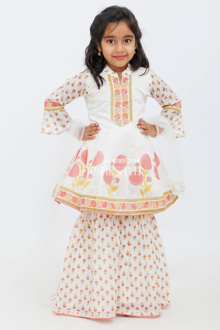The Nesavu Girls Sharara / Plazo Set Cream Cotton ALine Top with Floral Ghagra Set for Girls with Mirror Work Embellishments Nesavu 22 (4Y) / Cream GPS392B-22 Cream and Peach Cotton A-Line Top and Floral Ghagra Set for Girls with Mirror Work Nesavu