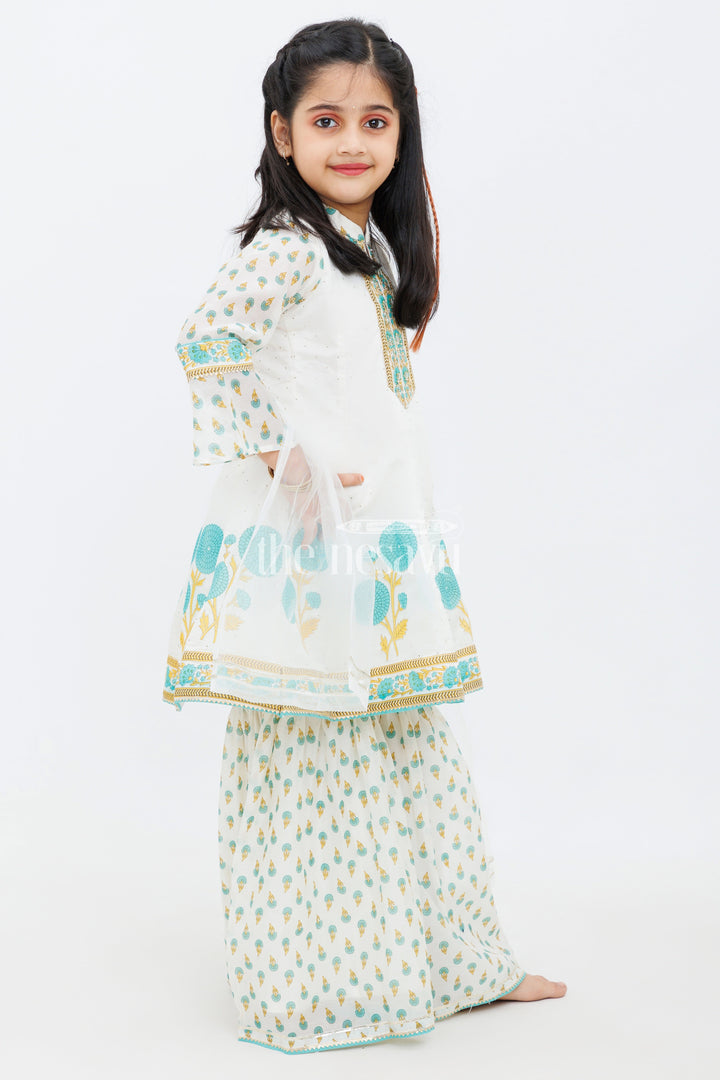 The Nesavu Girls Sharara / Plazo Set Cream Cotton ALine Top with Floral Ghagra Set for Girls with Mirror Work Embellishments Nesavu Cream Cotton A-Line Top and Floral Ghagra Set for Girls with Mirror Work Nesavu
