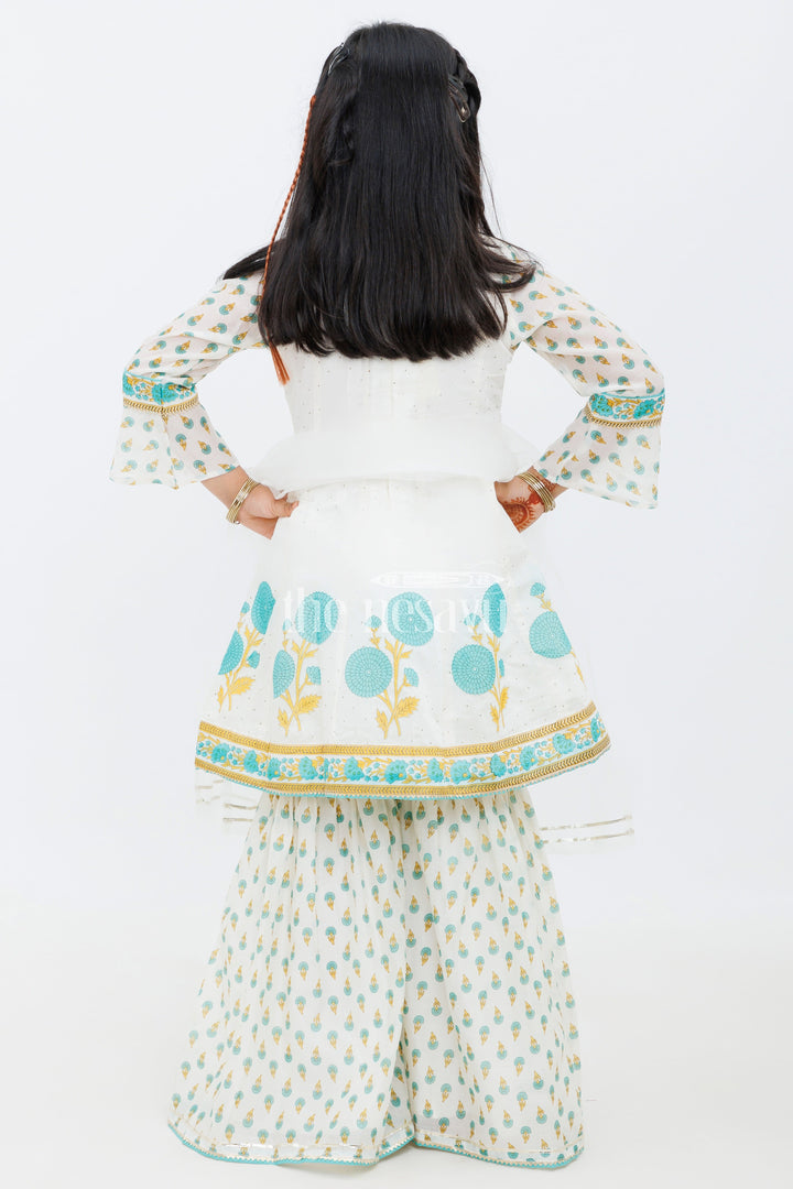 The Nesavu Girls Sharara / Plazo Set Cream Cotton ALine Top with Floral Ghagra Set for Girls with Mirror Work Embellishments Nesavu Cream Cotton A-Line Top and Floral Ghagra Set for Girls with Mirror Work Nesavu