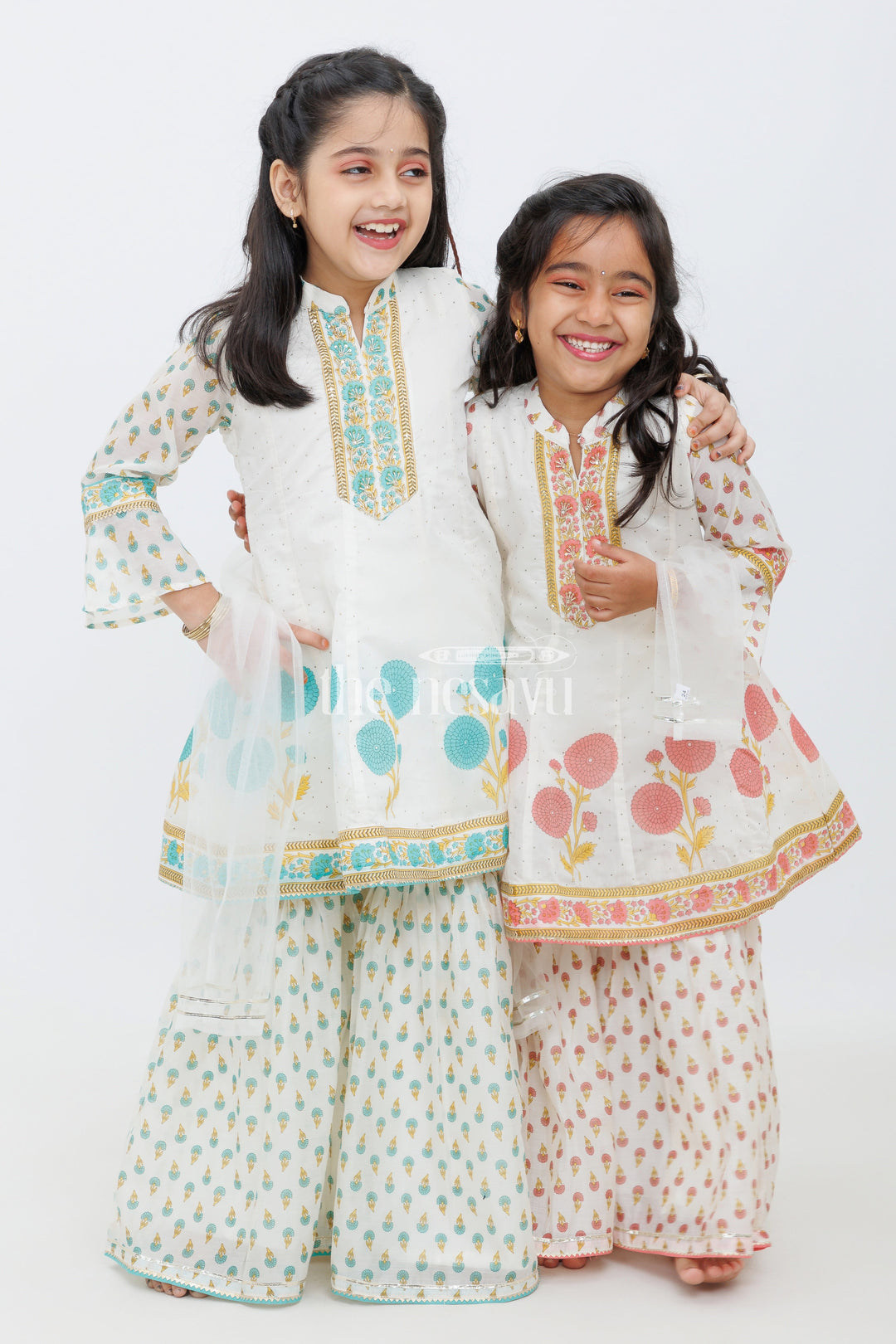 The Nesavu Girls Sharara / Plazo Set Cream Cotton ALine Top with Floral Ghagra Set for Girls with Mirror Work Embellishments Nesavu Cream Cotton A-Line Top and Floral Ghagra Set for Girls with Mirror Work Nesavu