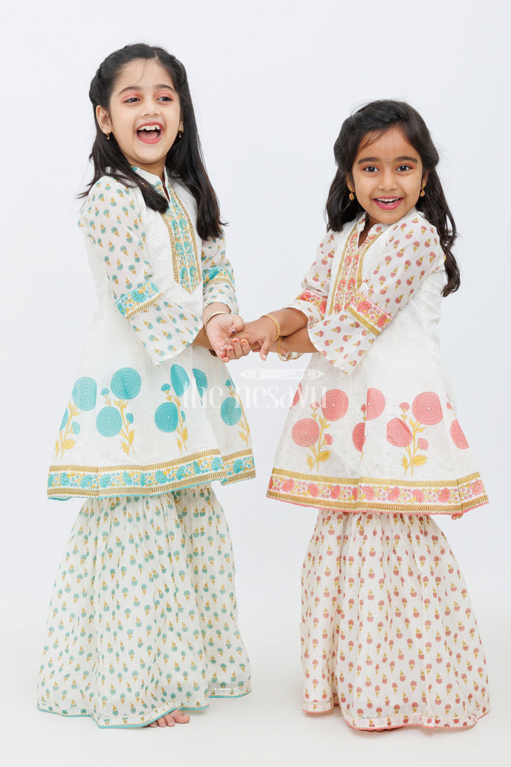The Nesavu Girls Sharara / Plazo Set Cream Cotton ALine Top with Floral Ghagra Set for Girls with Mirror Work Embellishments Nesavu Cream Cotton A-Line Top and Floral Ghagra Set for Girls with Mirror Work Nesavu