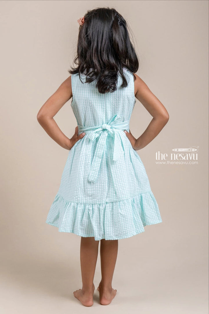 The Nesavu Girls Cotton Frock Cute Peter Pan Collared Chekered Pattern Turquoise Girls Frock With Floral Embroidered Design Nesavu Girls Cotton Frock Online | Casual Wear For Girls | The Nesavu