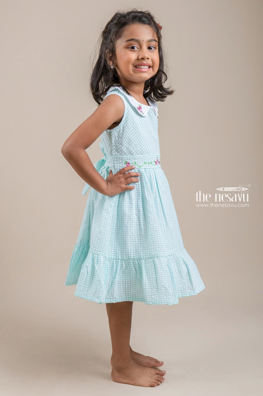 The Nesavu Girls Cotton Frock Cute Peter Pan Collared Chekered Pattern Turquoise Girls Frock With Floral Embroidered Design Nesavu Girls Cotton Frock Online | Casual Wear For Girls | The Nesavu