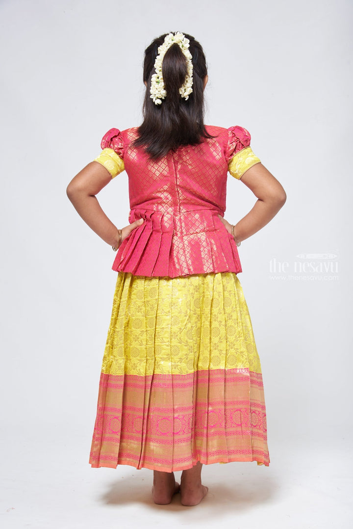 The Nesavu Pattu Pavadai Dazzling Brocade Pink Peplum Top with Banarasi Yellow Pattu Langa: Classic Silk Beauty Nesavu Banaras Silk Pattu Pavadai | Pattu Pavadai Sattai Designs | The Nesavu