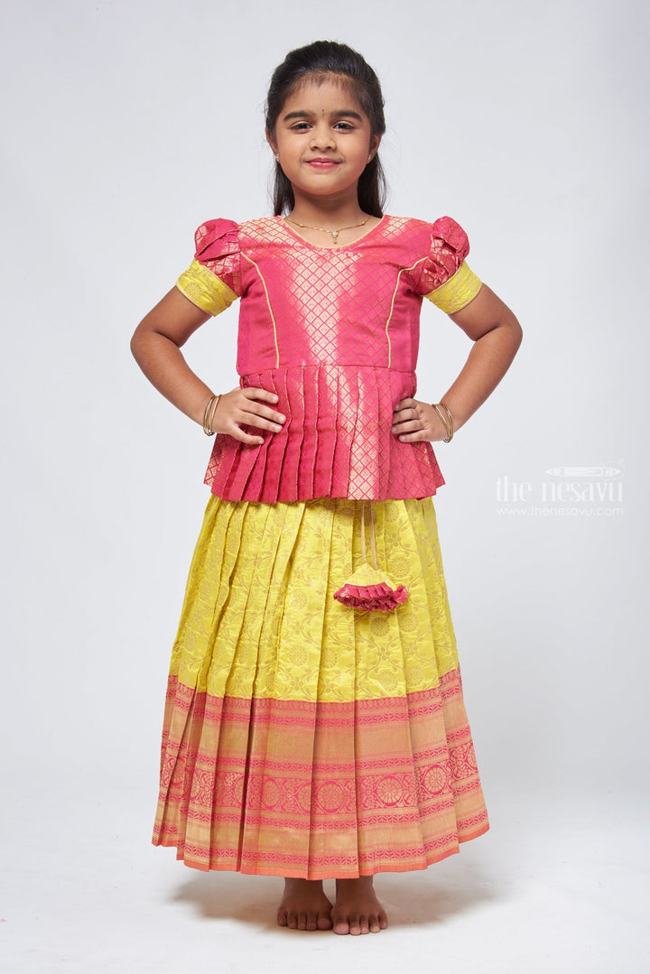 The Nesavu Pattu Pavadai Dazzling Brocade Pink Peplum Top with Banarasi Yellow Pattu Langa: Classic Silk Beauty Nesavu Banaras Silk Pattu Pavadai | Pattu Pavadai Sattai Designs | The Nesavu