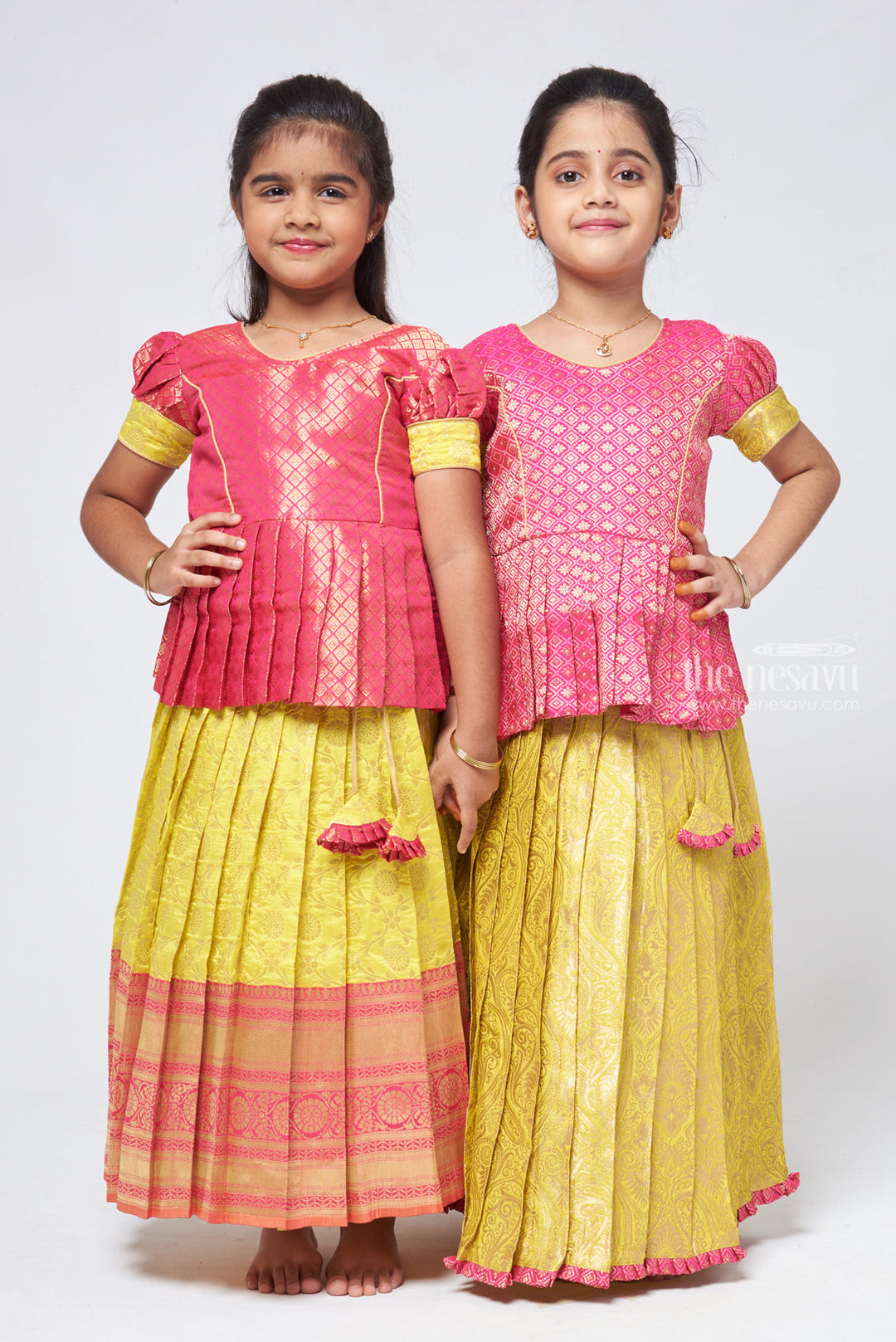 The Nesavu Pattu Pavadai Dazzling Brocade Pink Peplum Top with Banarasi Yellow Pattu Langa: Classic Silk Beauty Nesavu Banaras Silk Pattu Pavadai | Pattu Pavadai Sattai Designs | The Nesavu