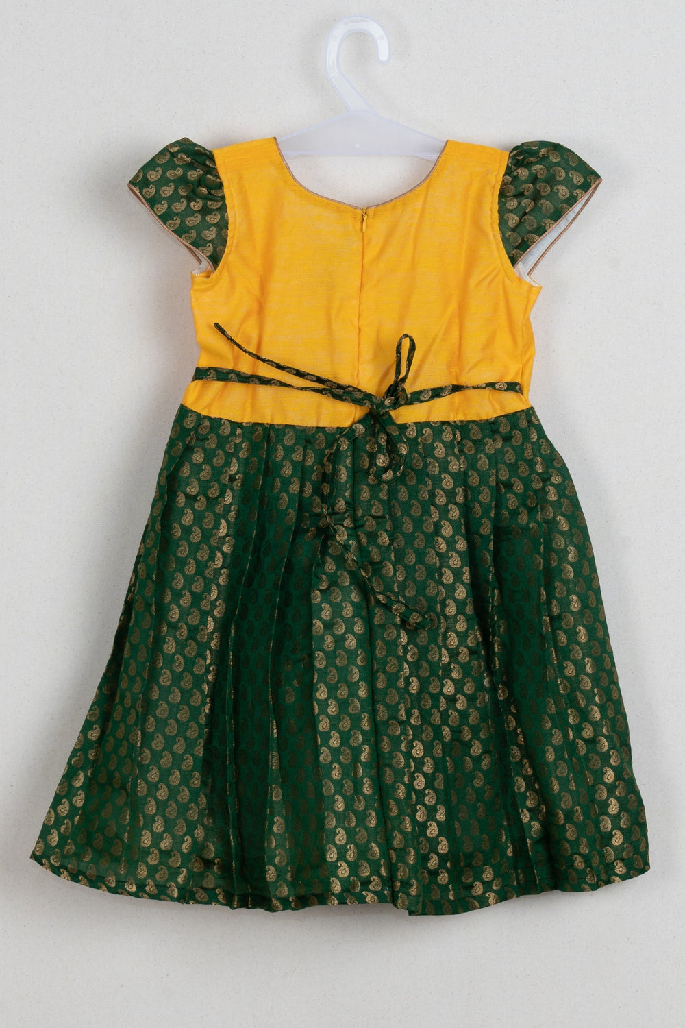 The Nesavu Silk Frock Delightful Yellow Silk Yoke & Pleated Paisley Elegance: Green Resham Attire for Young Divas. Nesavu Green Silk Frock | Latest Collection | The Nesavu