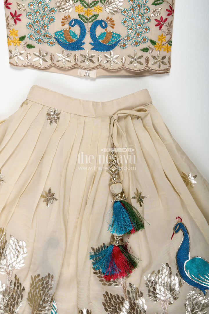 The Nesavu Girls Lehenga Choli Dress Lacha Beige Kora Silk Cotton Girls Lehenga Choli with Peacock and Deer Thread Embroidery Nesavu Nesavu Dress Lacha Girls Beige Kora Silk Cotton Lehenga Choli Peacock Embroidery Dupatta