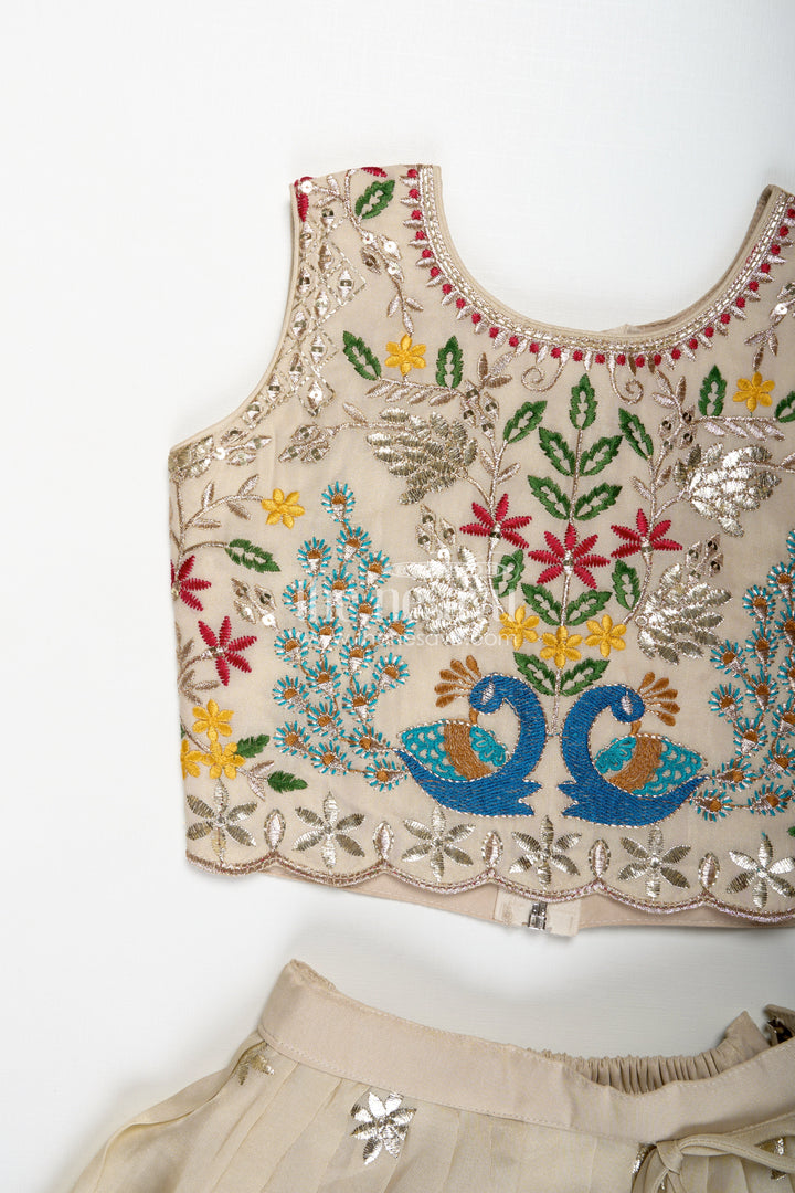 The Nesavu Girls Lehenga Choli Dress Lacha Beige Kora Silk Cotton Girls Lehenga Choli with Peacock and Deer Thread Embroidery Nesavu Nesavu Dress Lacha Girls Beige Kora Silk Cotton Lehenga Choli Peacock Embroidery Dupatta