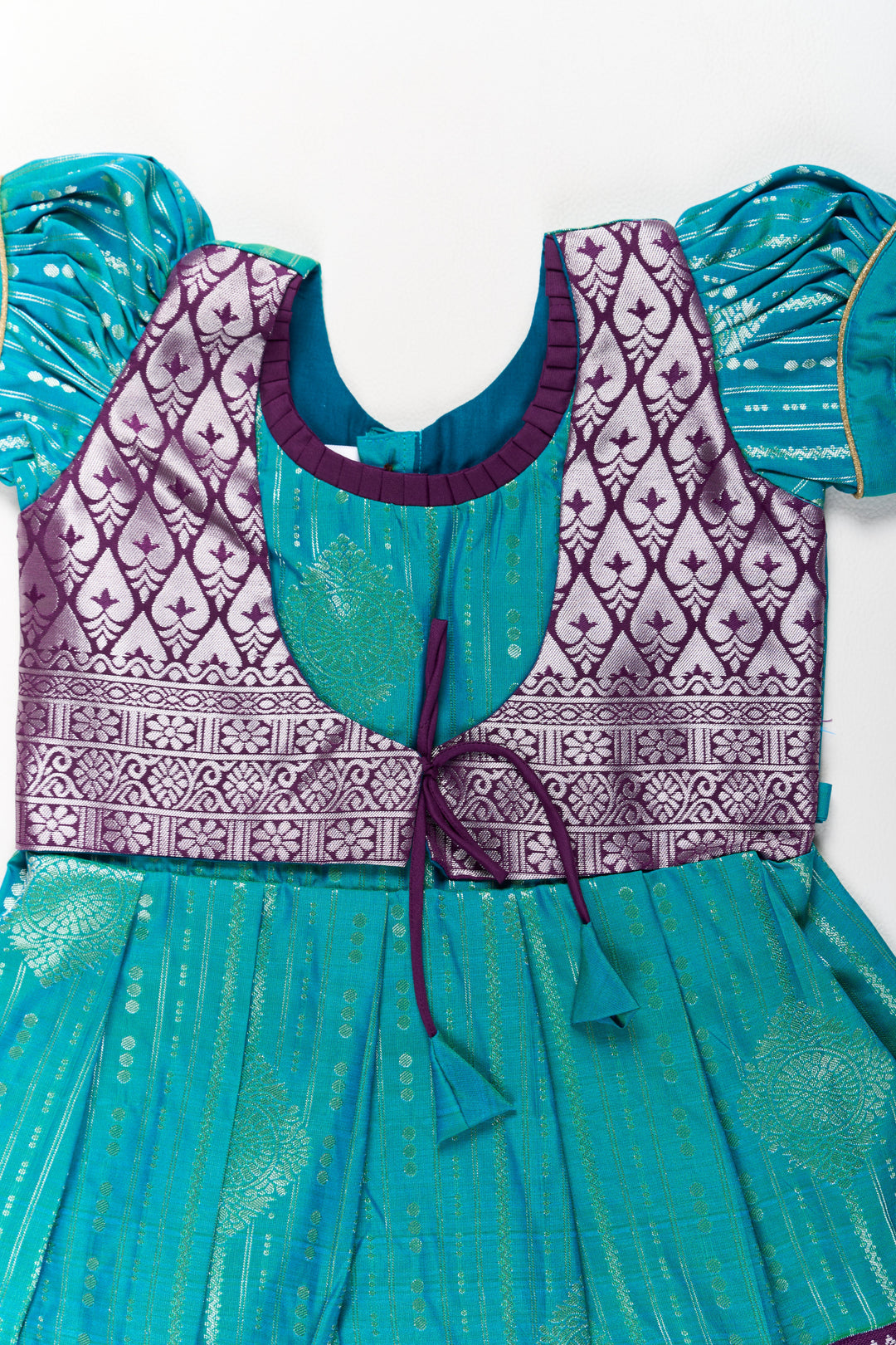 The Nesavu Girls Kanchi Silk Frock Elegant Blue and Silver Pattu Pavadai Sattai for Girls with Zari Work Nesavu Nesavu Elegant Blue Silver Pattu Pavadai Sattai Girls Zari Work