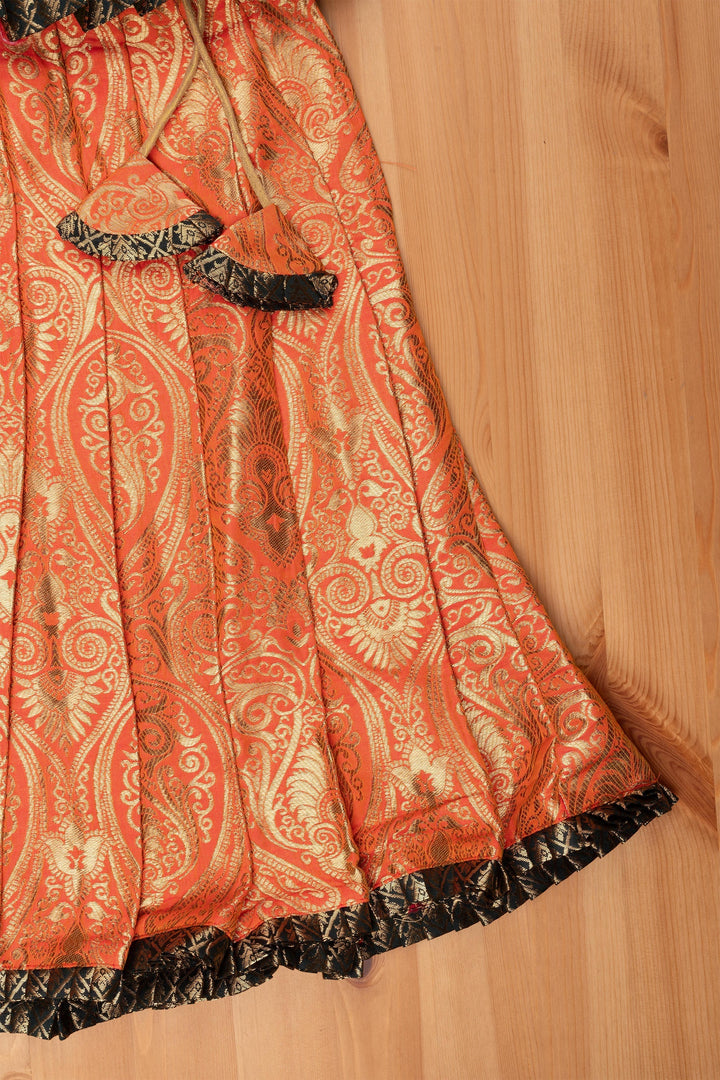 The Nesavu Pattu Pavadai Elegant Brocade Peplum Green Blouse paired with Banarasi Salmon Pink Pattu Pavadai: Timeless South Indian Nesavu Elegant Brocade Designer Pattu Pavadai for Girls | Banaras Silk Pattu Pavadai | The Nesavu