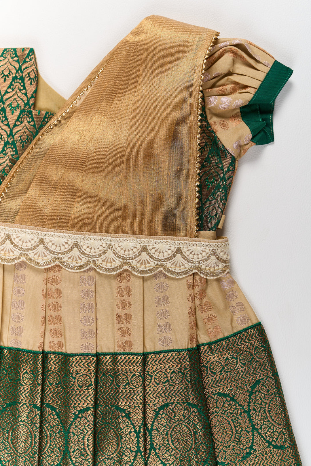 The Nesavu Girls Kanchi Silk Frock Elegant Cream and Green Pattu Pavadai for Girls with Traditional Zari Accents Nesavu Nesavu Elegant Cream Green Pattu Pavadai Girls Traditional Zari Accents