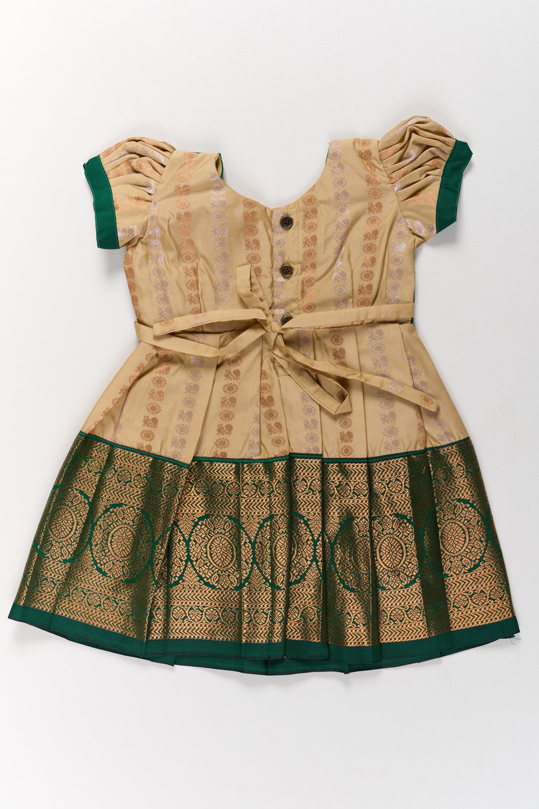 The Nesavu Girls Kanchi Silk Frock Elegant Cream and Green Pattu Pavadai for Girls with Traditional Zari Accents Nesavu Nesavu Elegant Cream Green Pattu Pavadai Girls Traditional Zari Accents