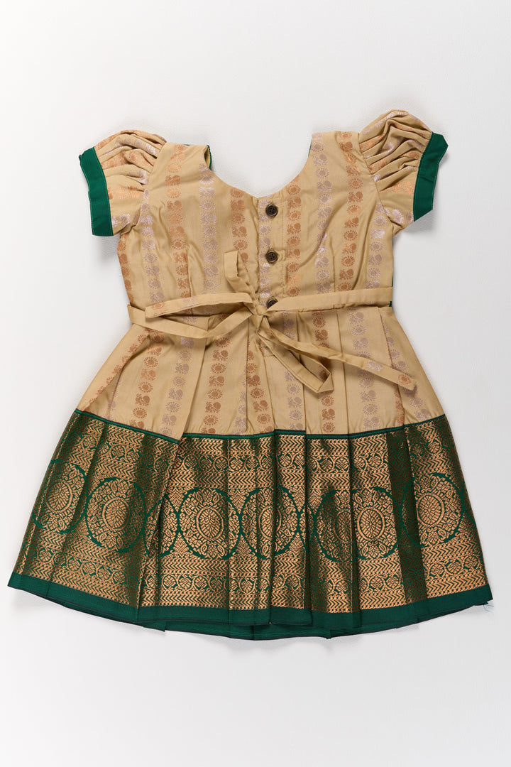 The Nesavu Girls Kanchi Silk Frock Elegant Cream and Green Pattu Pavadai for Girls with Traditional Zari Accents Nesavu Nesavu Elegant Cream Green Pattu Pavadai Girls Traditional Zari Accents
