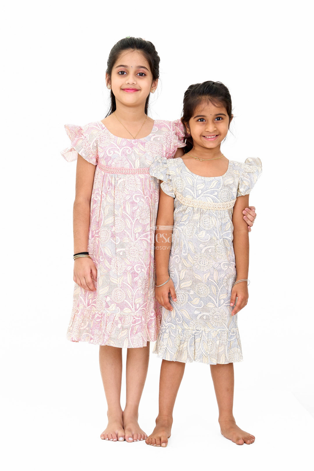 The Nesavu Girls Cotton Frock Elegant Girls Floral Cotton Dress with Vibrant Print and Ruffle Details Nesavu Nesavu Girls Floral Cotton Dress Lace Yoke Ruffle Hem Cheerful Print Spring Events