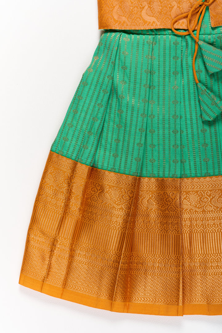 The Nesavu Girls Kanchi Silk Frock Elegant Green and Gold Pattu Full Frock for Girls with Traditional Zari Weaving Nesavu Nesavu Elegant Green Gold Pattu Full Frock Girls Traditional Zari Weaving