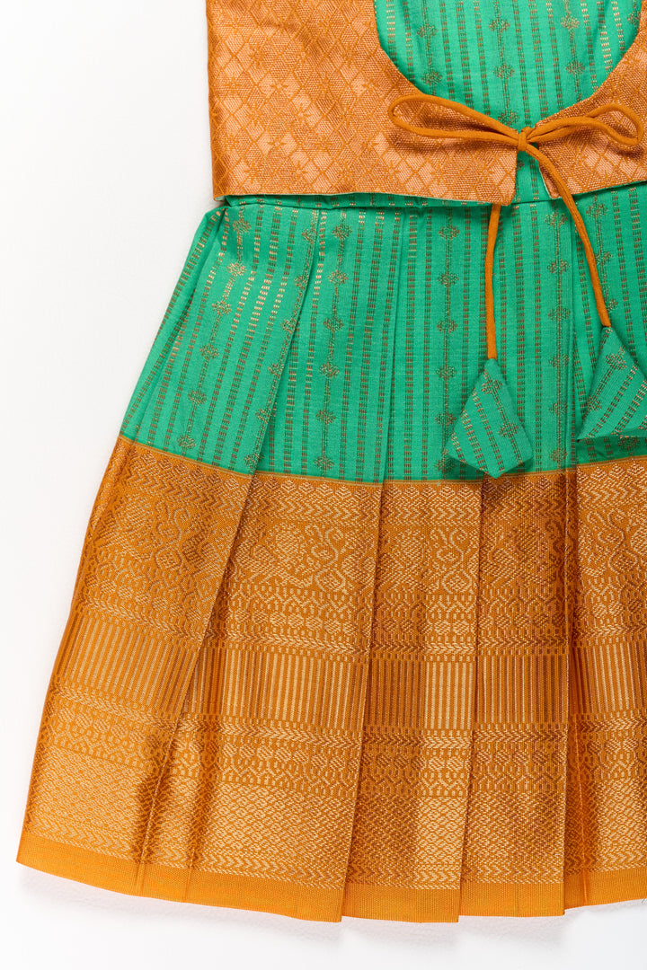 The Nesavu Girls Kanchi Silk Frock Elegant Green and Gold Pattu Full Frock for Girls with Traditional Zari Weaving Nesavu Nesavu Elegant Green Gold Pattu Full Frock Girls Traditional Zari Weaving