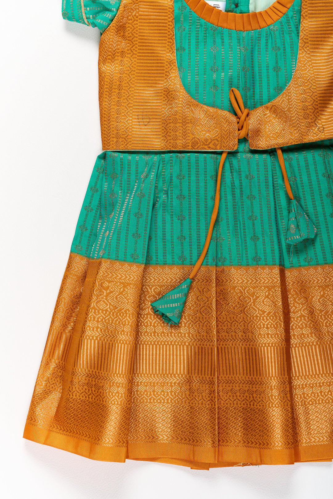 The Nesavu Girls Kanchi Silk Frock Elegant Green and Gold Pattu Full Frock for Girls with Traditional Zari Weaving Nesavu Nesavu Elegant Green Gold Pattu Full Frock Girls Traditional Zari Weaving