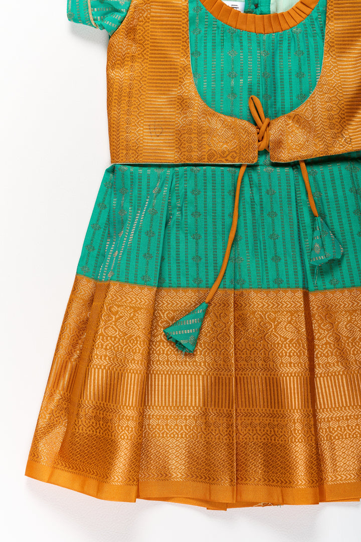The Nesavu Girls Kanchi Silk Frock Elegant Green and Gold Pattu Full Frock for Girls with Traditional Zari Weaving Nesavu Nesavu Elegant Green Gold Pattu Full Frock Girls Traditional Zari Weaving