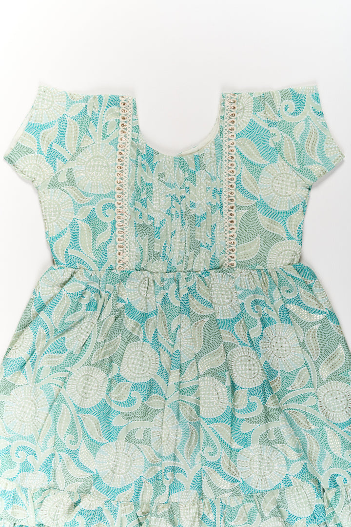 The Nesavu Girls Cotton Frock Elegant Green Cotton Designer Frock for Girls with Floral Prints and Frill Details Nesavu Nesavu Elegant Green Cotton Designer Frock Girls Floral Prints Frill Details