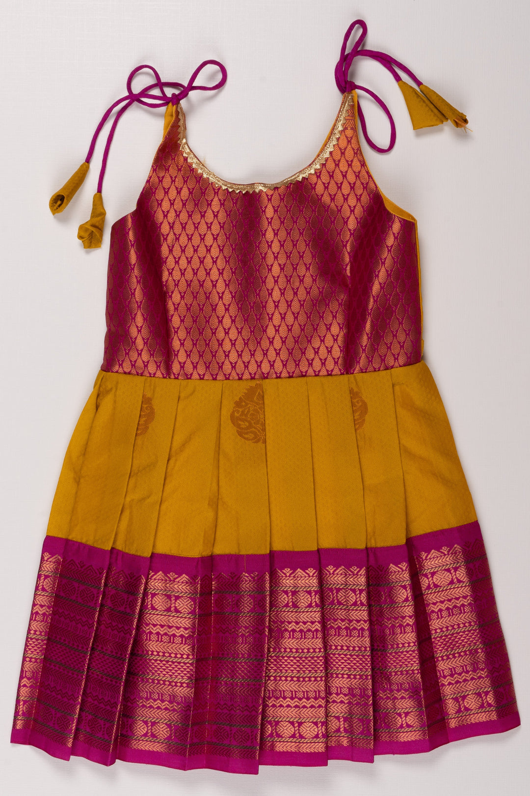 The Nesavu Tie Up Frock Elegant Magenta and Yellow Silk Blend TieUp Frock with Intricate Gold Border Detailing Nesavu 14 (6M) / Yellow / Style 1 T338A-14 Magenta and Yellow Silk Frock | Ethnic Party Dress with Gold Detailing | The Nesavu