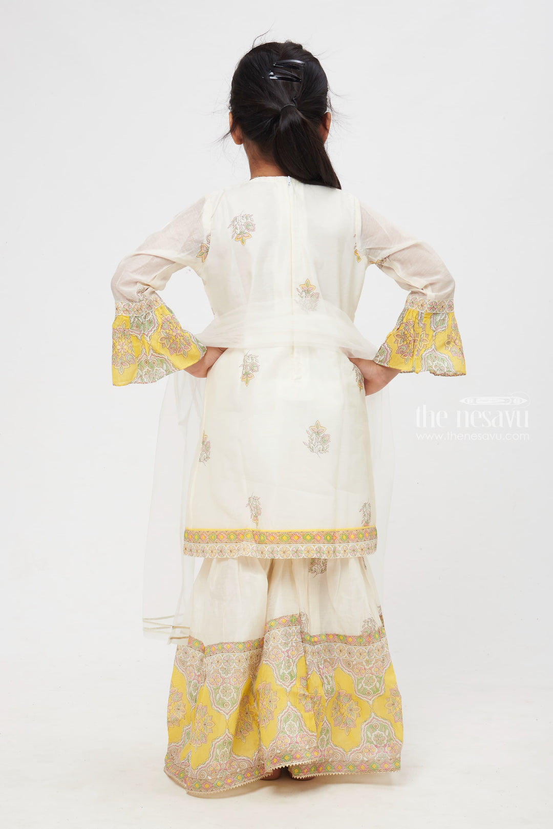 The Nesavu Girls Sharara / Plazo Set Elegant Medallion Print Ensemble for Kids: White and Yellow Floral Printed Stylish Kurti with Sharara Pant Set Nesavu Kids Elegant Medallion Print Ensemble | Classic Design with Floral Accents | Festive Wear for Children