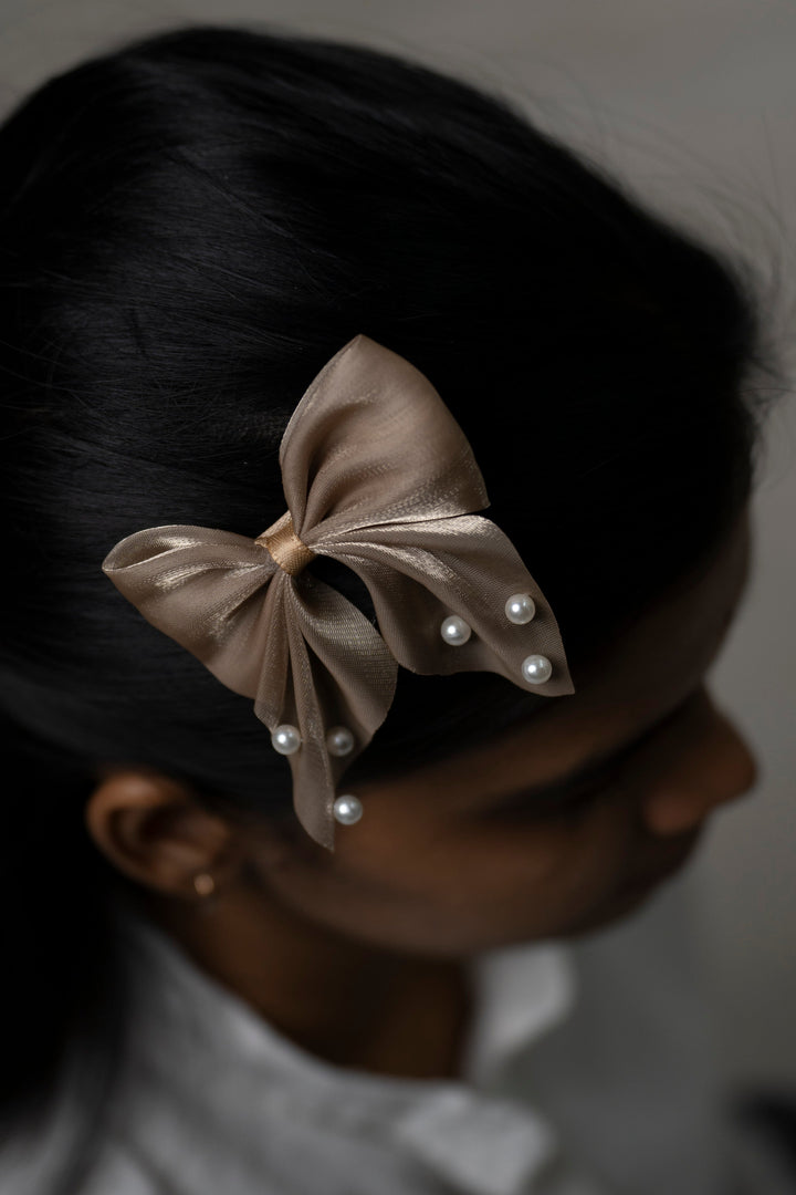 The Nesavu Hair Clip Elegant Satin Pearl Hair Clip for Luxurious Styling Nesavu Brown JHCL76D Chic Satin Bow Hair Clip with Pearls | Sophisticated Accessory for Special Occasions | The Nesavu