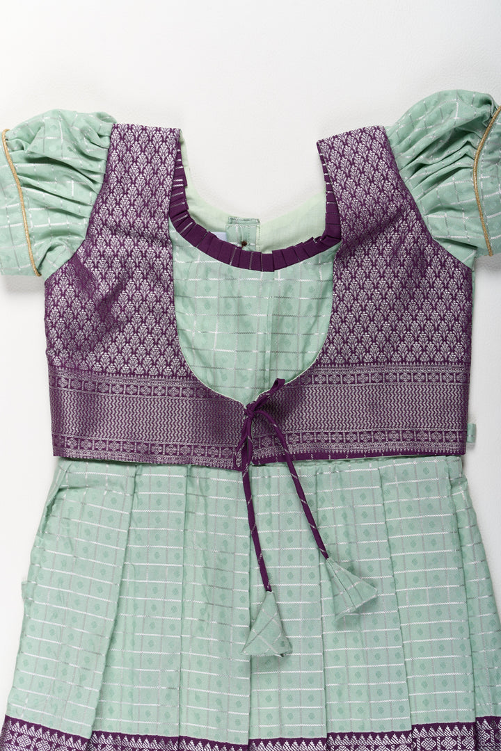 The Nesavu Girls Kanchi Silk Frock Elegant Sea Green and Purple Pattu Pavadai for Girls with Rich Zari Borders Nesavu Nesavu Elegant Sea Green Purple Pattu Pavadai Girls Rich Zari Borders